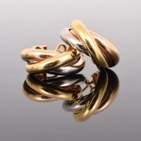 Pair of Cartier Trinity 18K Gold Earrings - Sold for $1,750 on 05-15-2021 (Lot 120).jpg
